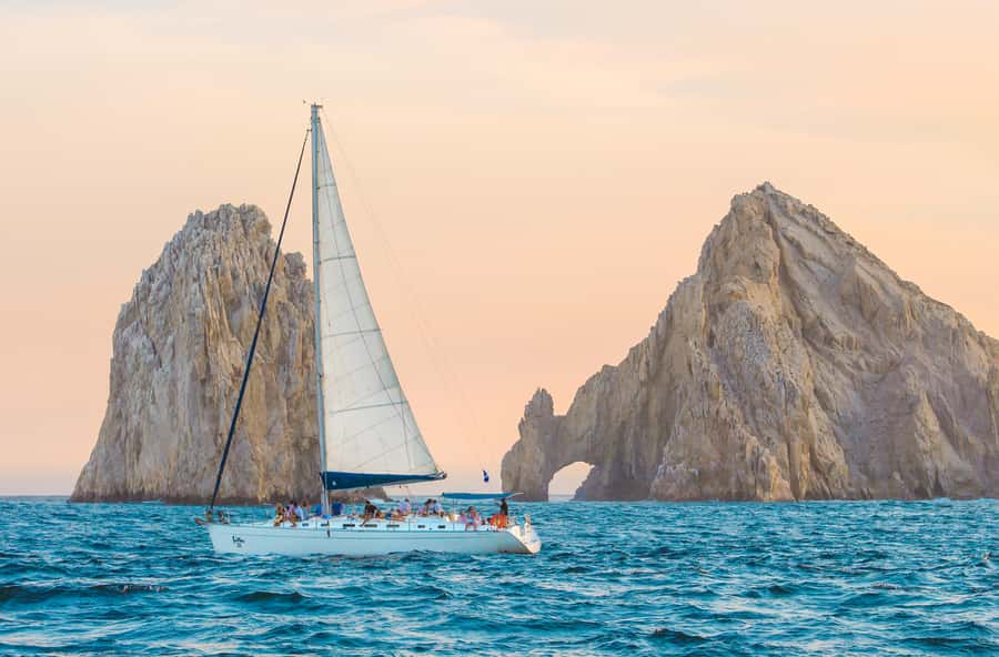 Cabo Luxury Sunset Sailing Adventure with Open Bar - Boarding rules: shoes off, and how to pack like a local