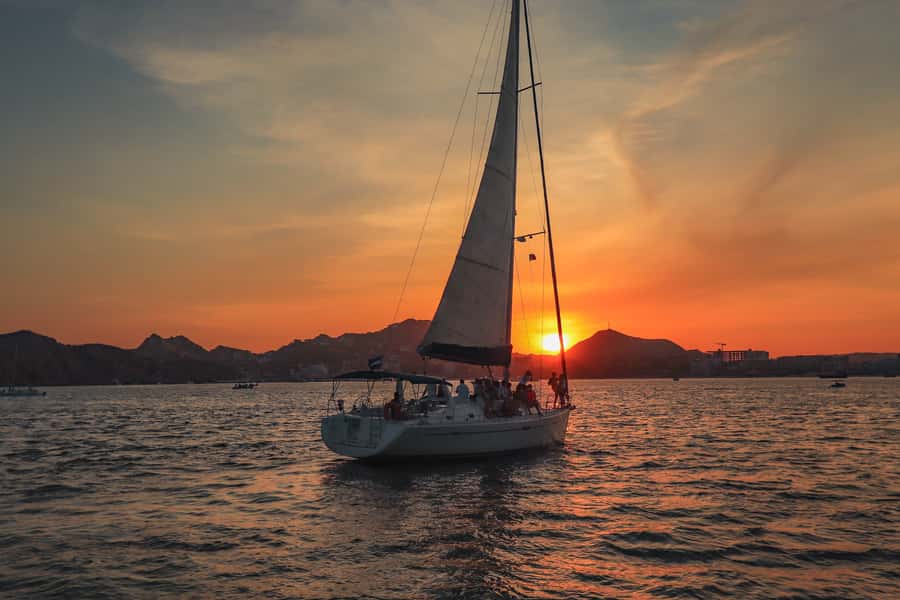 Cabo Luxury Sunset Sailing Adventure with Open Bar - The sunset moment: sailing as the Pacific meets the Sea of Cortez