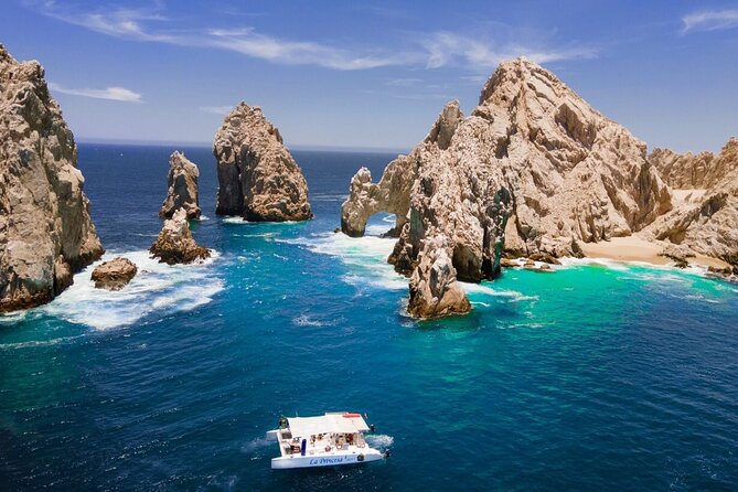Cabo San Lucas Sunset Cruise with Unlimitted Drinks - Lovers Beach and beachfront properties: why water-level views matter