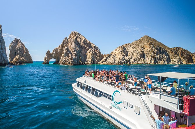 Cabo Sunset Dinner Cruise with Live Music & Open Bar on Cabo Wave - Getting Started at La Terminal, Cabo Marina