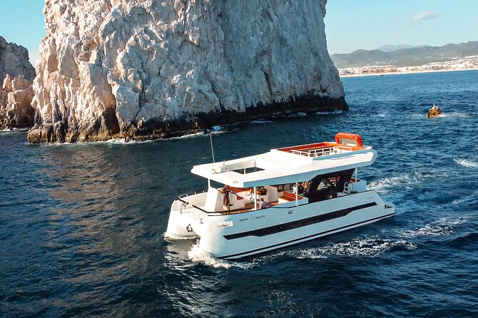 Catamaran - Luxury Private Tour - Lover’s Beach and Divorce Beach stories, plus rock formation explanations from the water