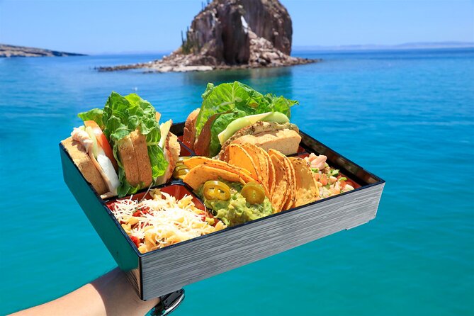 Half Day Cabo Snorkel Adventure with Lunch and Open Bar - Lunch on deck plus open bar, timed the right way