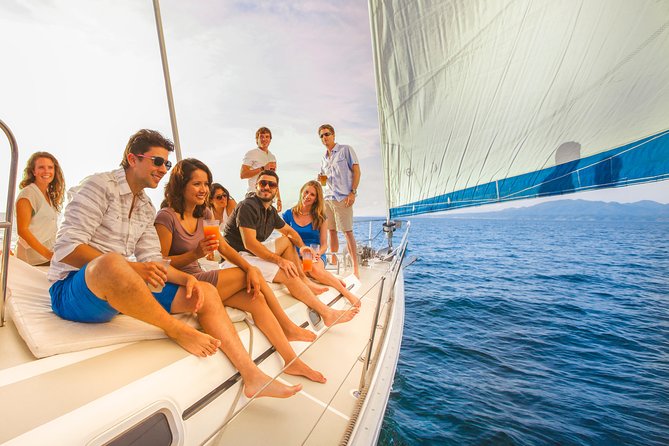 Los Cabos Luxury Sunset Sail with Light Appetizers and Open Bar - Price and Logistics: pickup timing, footwear, and the marina check-in