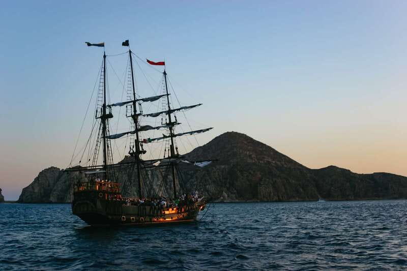 Los Cabos: Pirate Ship Sunset Cruise & Show with Dinner - The pirate show near the Arch: chanting, dancing, and rope climbing