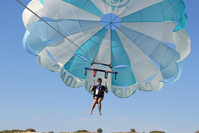 Parasailing Los Cabos Adventure - The Boat Ride Out: Harness On, One Person at a Time