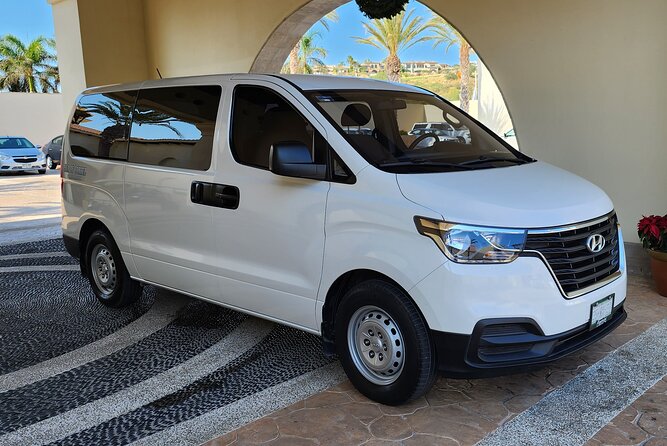 Private Transportation from Los Cabos Airport to ROUND TRIP Hotels - Airport Pickup: Finding Your Driver at Terminal 2, Umbrella 10