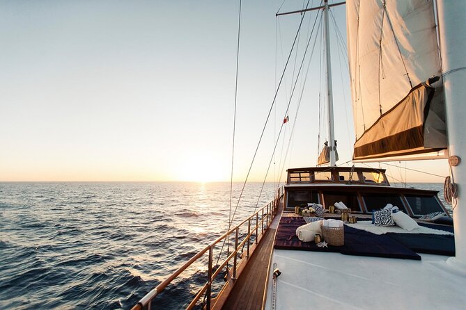 Romantic Sailboat Sunset: Live Music, Premium Bar & Dinner -Cabos - Dinner on Board: The Baja Duo, Salad, and Dessert