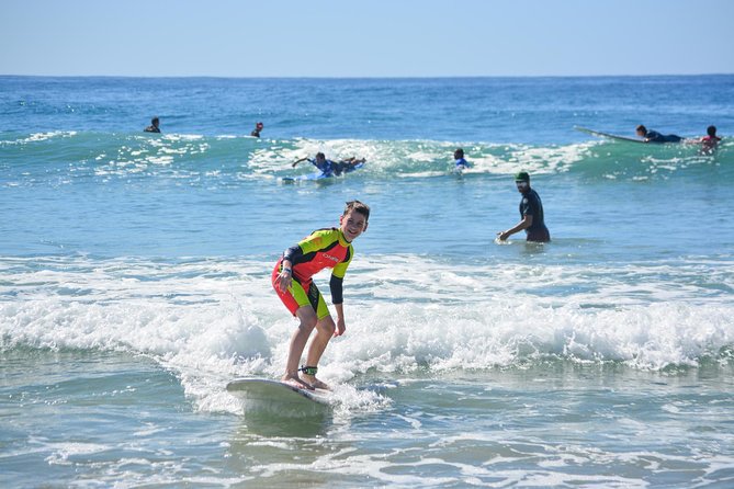 Surf Lessons at Cerritos - The Cerritos Surf Town staging area: boards, wetsuits, and your first steps