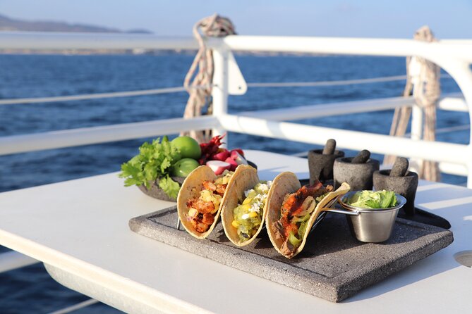 Tacos buffet & Open Bar Cruise! Los Cabos Round Transportation - Taco buffet on the water: what the meal experience feels like