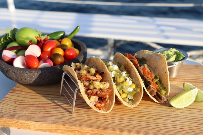 Tacos buffet & Open Bar Cruise! Los Cabos Round Transportation - The cruise: Lover’s Beach, the sea lion colony, and the Los Cabos Arch