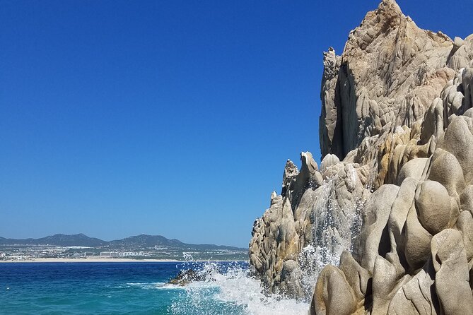 Water Taxi to the Arch of Cabo San Lucas with Transportation - Glass-bottom boat views: Sea Lions, Neptune’s Finger, Pelican Rock, Lands End